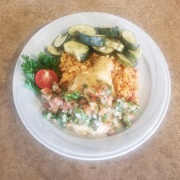 Brazilian chicken over Spanish rice with zucchini