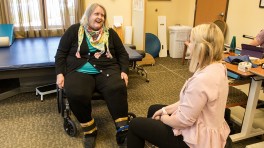 Physical Therapist Cassie Heil helps Meribeth Arndt during her recovery. 